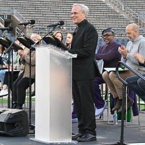 Notre Dame President Rev. John I. Jenkins, C.S.C. introduces the 2022 Notre Dame Forum, themed ‘War & Peace,’ with a reading from the ancient Greek tragedy ‘The Suppliants’ held in Notre Dame Stadium